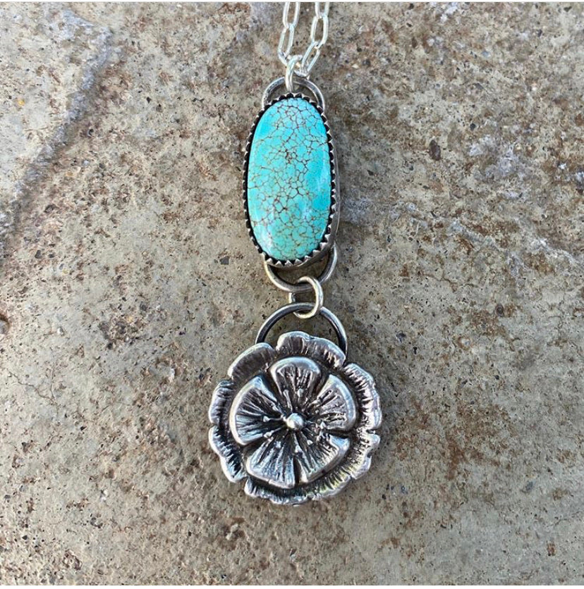 Turquoise pendant with prickly pear flower