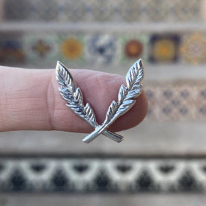 sterling silver feather border casting on finger