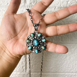 Turquoise necklace with half circle accent castings