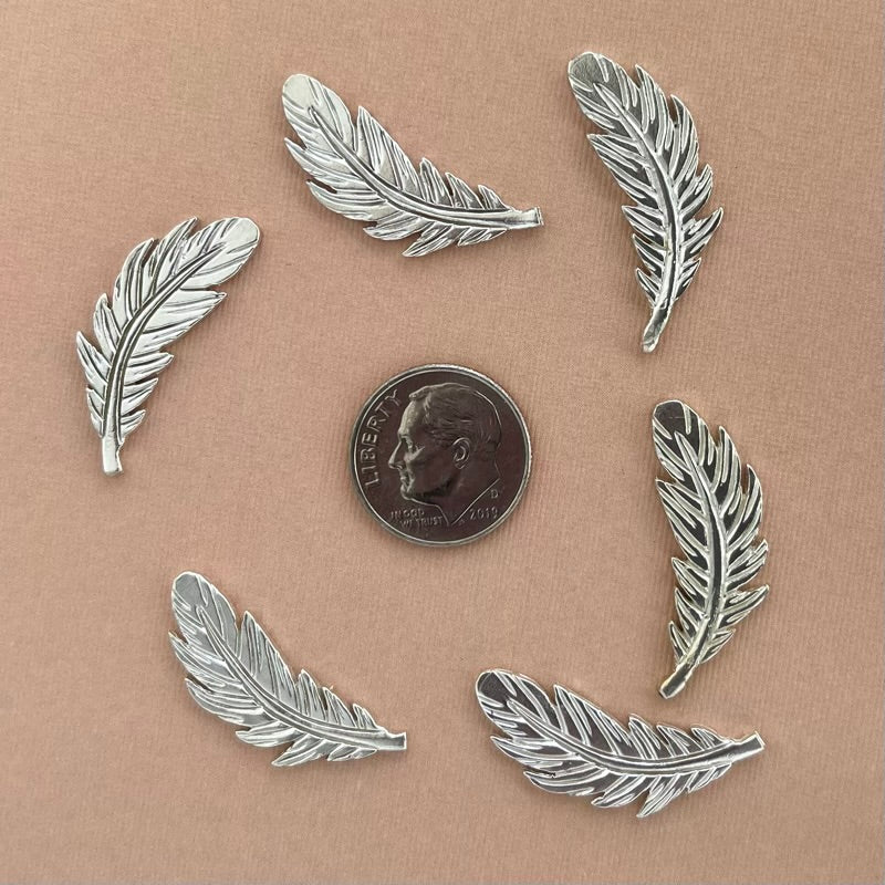 silver feather charm