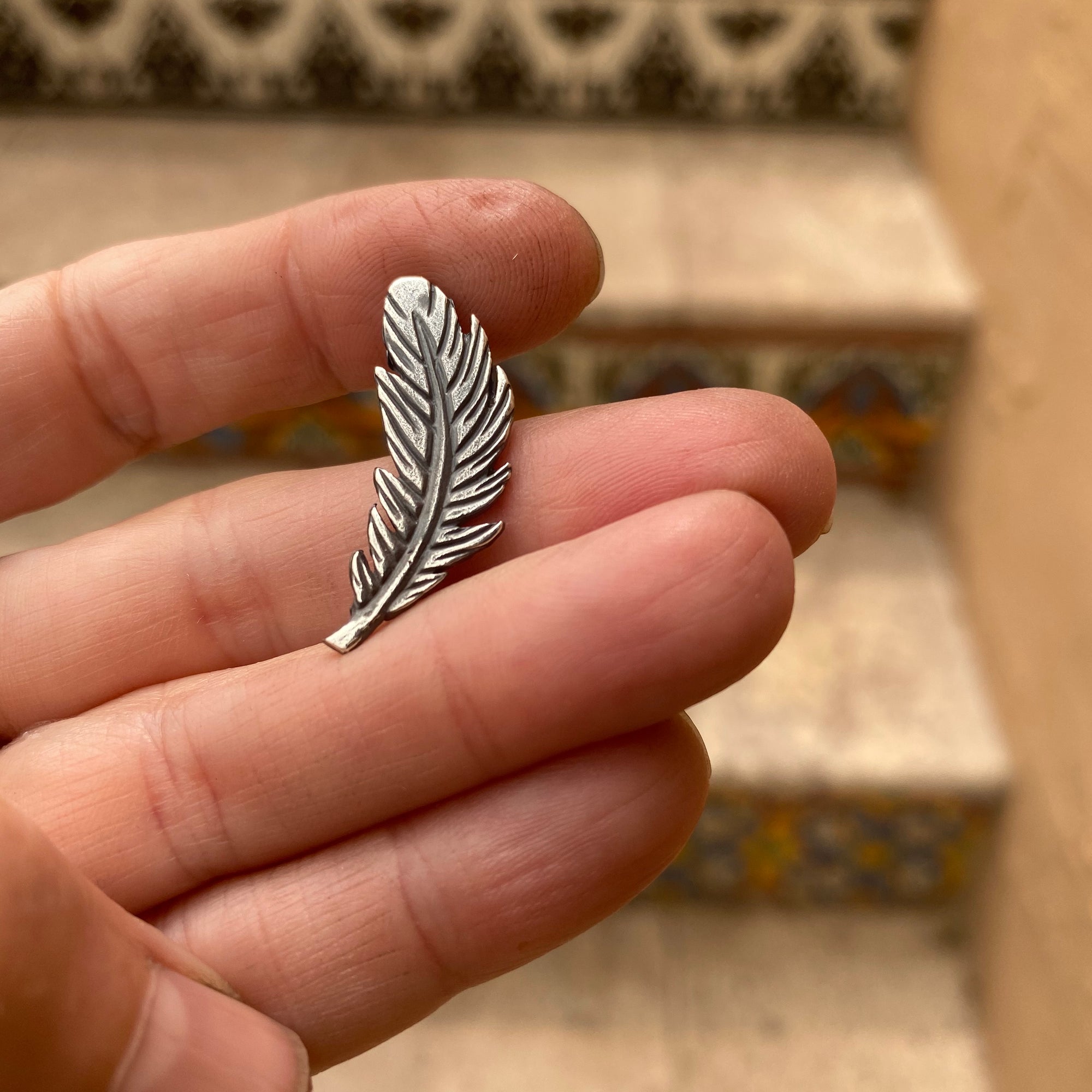 sterling silver feather casting with patina